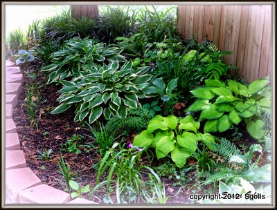 Yard and Garden Secrets: Pavestone Adds Definition to Flower Garden