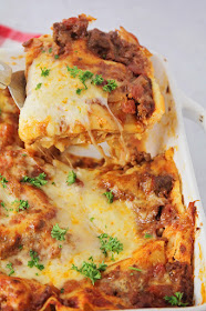 This delicious lasagna is truly the best! The recipe makes two pans, so it's easy to bake one and put another in the freezer for later!