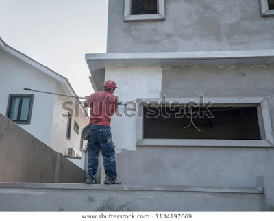 painting on newly constructed wall