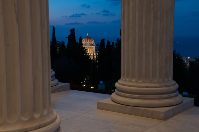 Shrine of the Báb viewed in between the collonade of the Seat of the Universal House of Justice