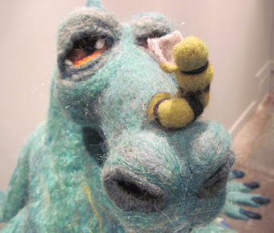 Detail in "Bedtime for Dragon" created in felt by Kathy Batdorf