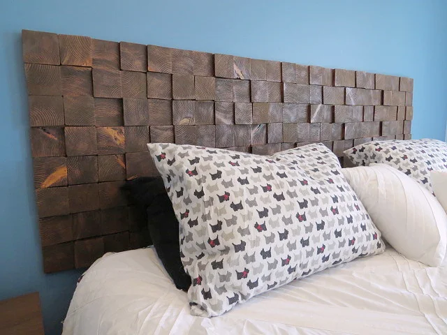 side view of wood block headboard on wall