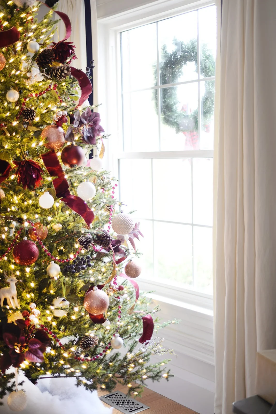 LED Christmas tree, faux fir Christmas tree. Red and white Christmas tree decorations.