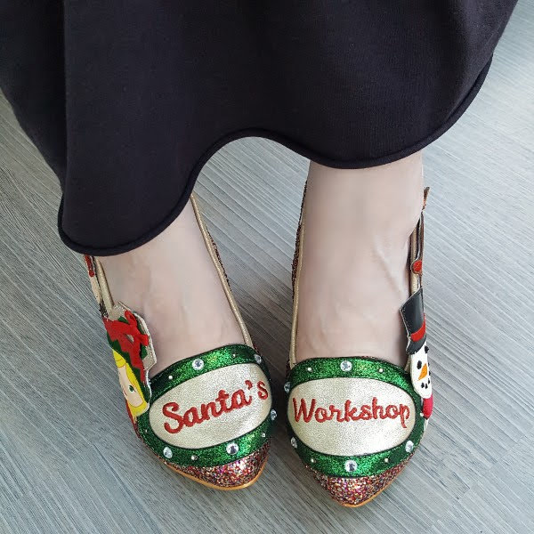 wearing Irregular Choice Santa's Helper festive shoes