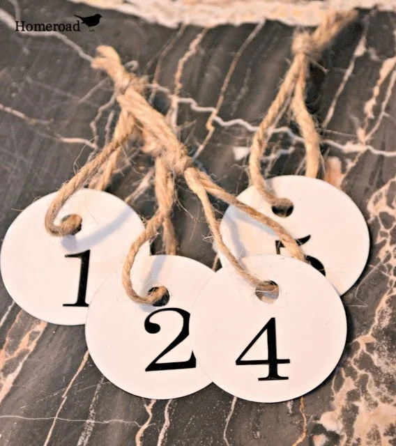 cluster of metal hang tags with numbers