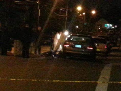 Cops examine car in which Michael Meldish was killed in the Bronx in 2013.