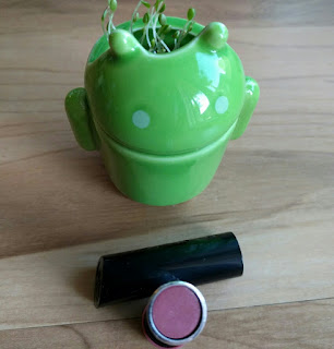 Rimmel The Only 1 Lipstick (color: Naughty Nude) Rimmel The Only 1 Lipstick (color: Naughty Nude) and green Android planter with clover