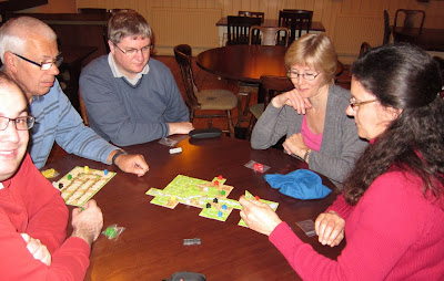 The team playing Carcassonne