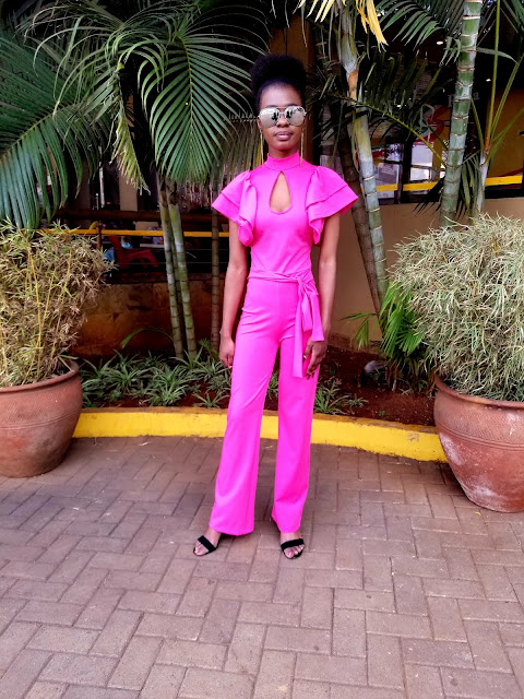 How To Pull Of A Jumpsuit That's Bright Pink