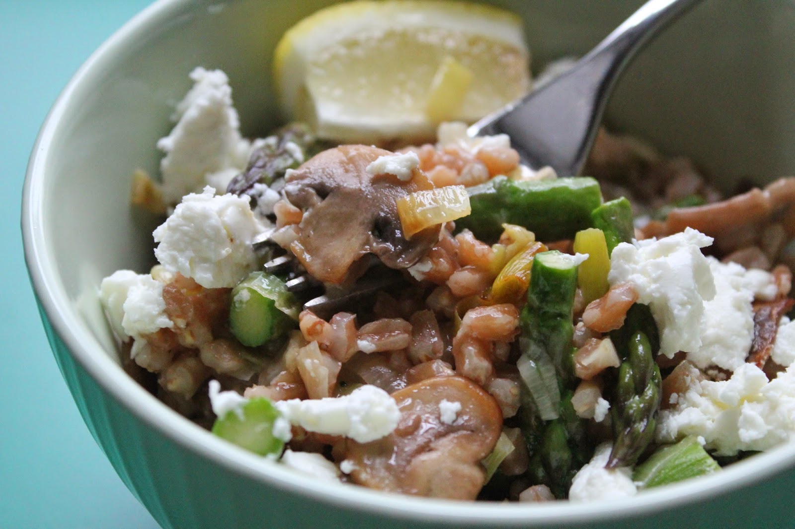 Farro "risotto" with mushrooms, asparagus, and goat cheese
