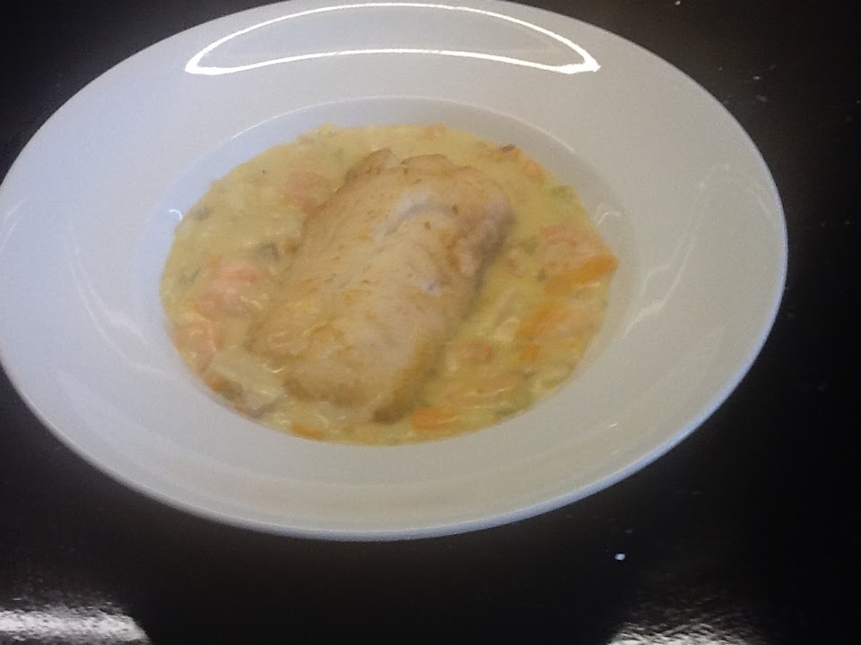 Willie's Daily Dish Pan Fried Cod served on a Seafood Chowder