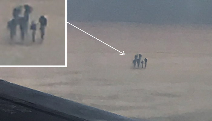 Hombre fotografía extrañas figuras sobre las nubes desde un avión de pasajeros Hombre7