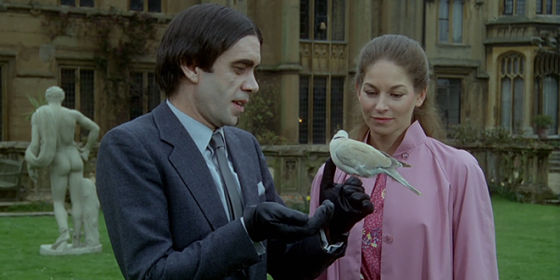 James Laurenson at a country house holding a dove, with Barbara Kellerman