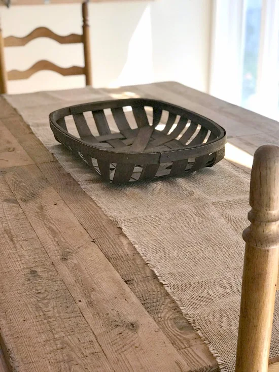 Wooden table with tobacco basket in the center