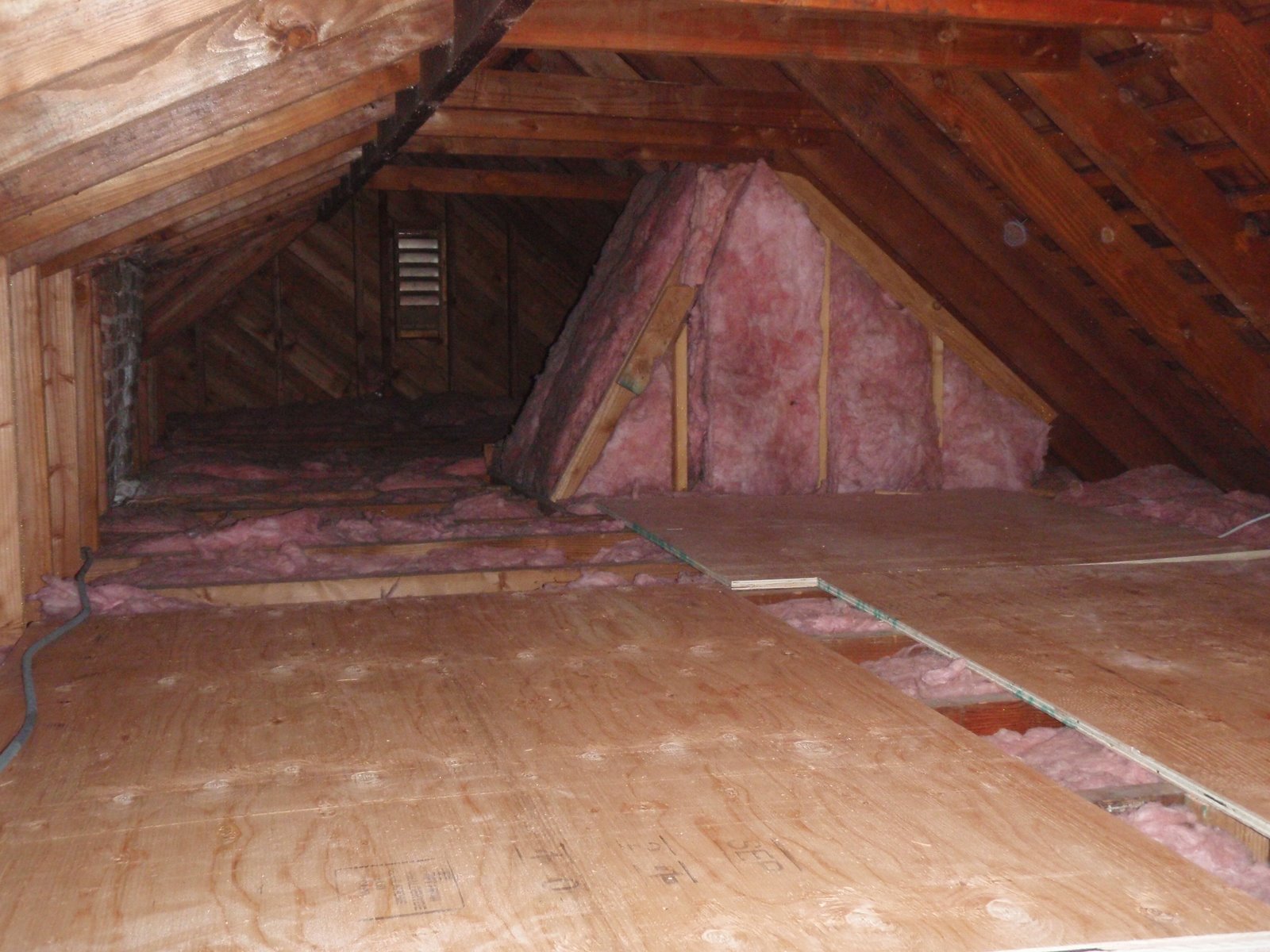Home Pride Contracting Installing plywood in an attic