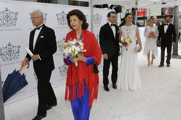 Queen Silvia, Crown Princess Victoria and Prince Daniel, Prince Carl Philip and Princess Sofia of Sweden attend Polar Music Prize 2016. Princess Victoria wore Ralph Lauren Dora V-Back Gown