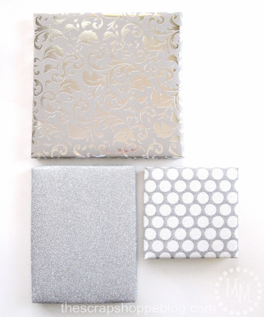 gift wrap all canvases with scrapbook paper