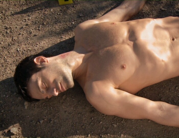 Jon Fleming manages to crawl a few feet before collapsing dead on the beach...