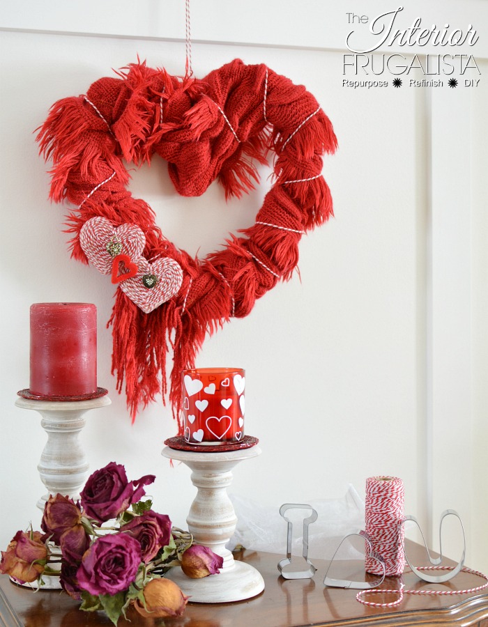 A quick, easy, and budget-friendly Valentine heart wreath idea made with a recycled red scarf. Once Valentine's Day is over, it can be worn again.