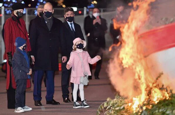 Princess Charlene wore a new leather-trimmed wool-blend tweed coat from Akris. Princess Gabriella wore a tweed jacket and skirt from Jacadi, Dior