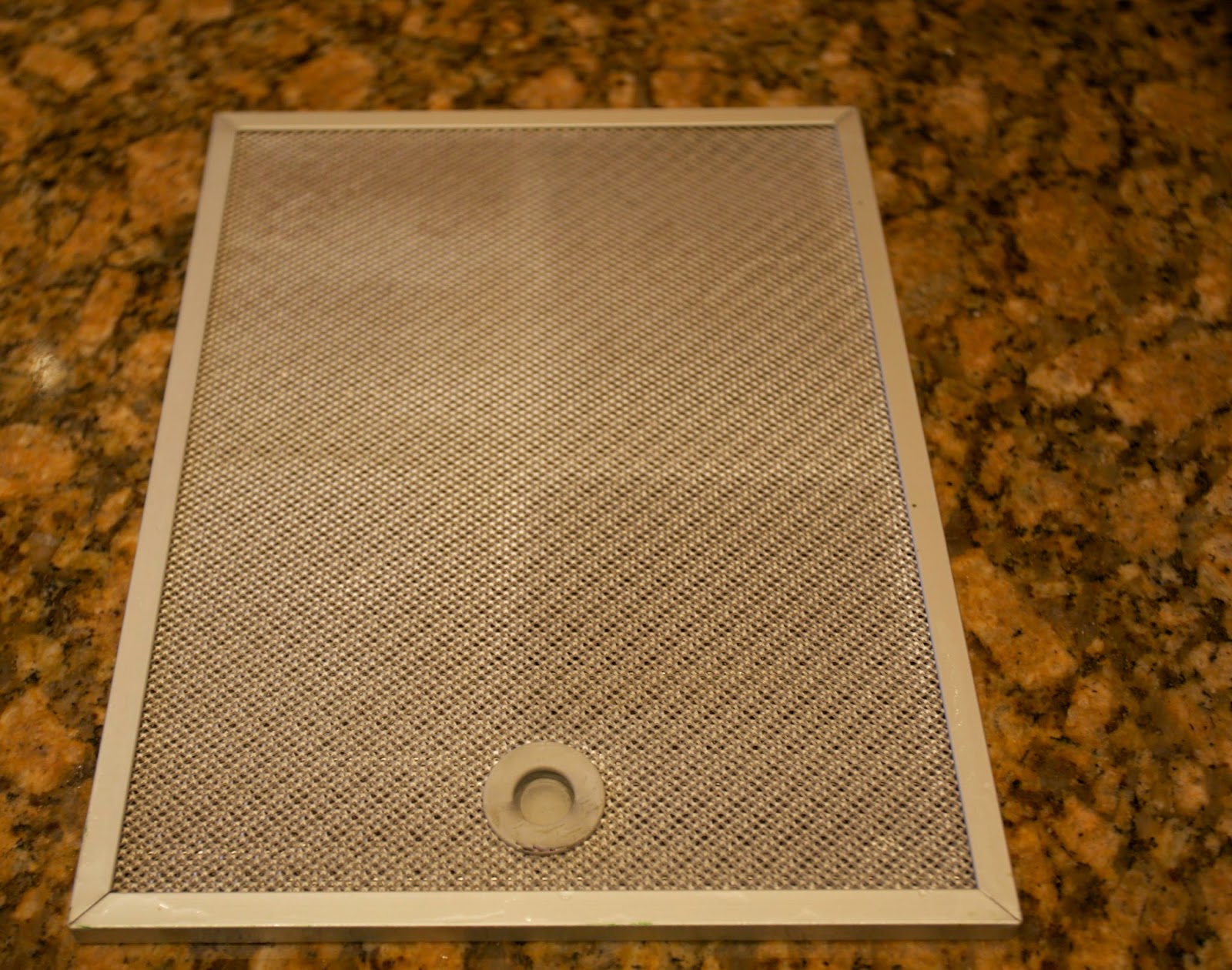 How to Clean Those Greasy Stove Hood Filters