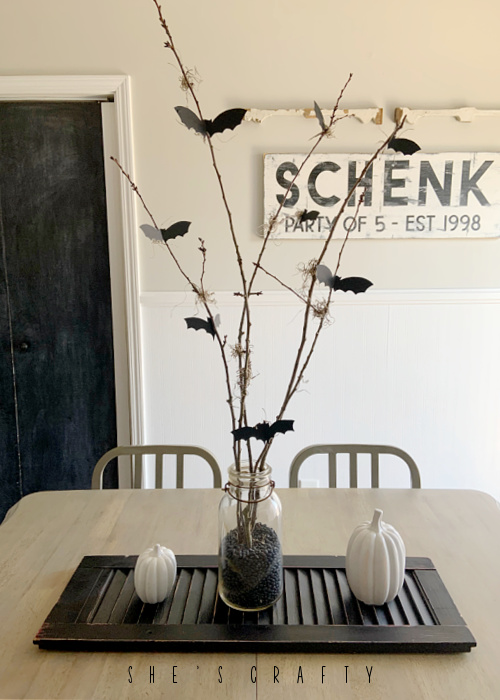 Halloween bat and branch table centerpiece -  bats and branches on a vintage shutter