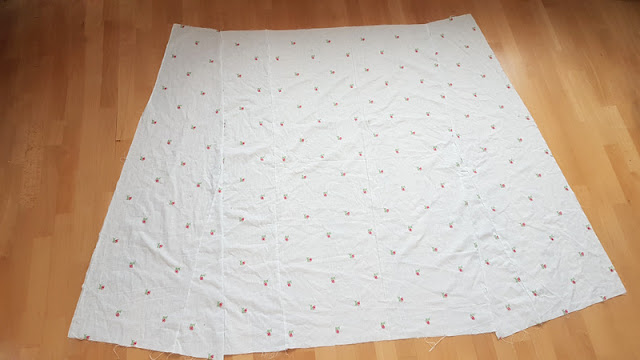 back skirt panels sewed together to form a large back part