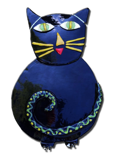 Some ceramic artwork is very heavy and needs special hangers How to hang ceramic art - Ed's big black clay cat