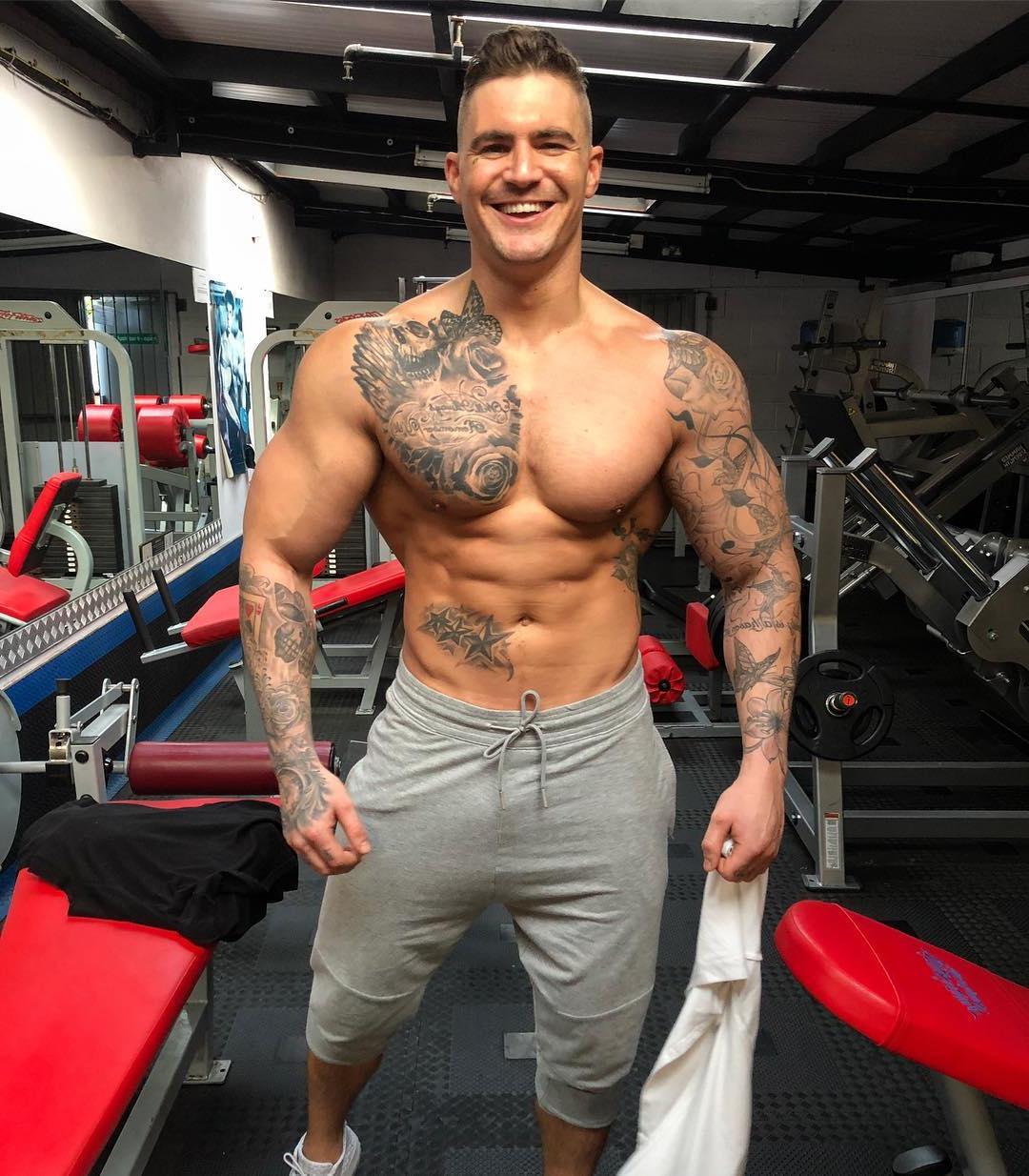 masculine-man-shirtless-tattoo-body-dickerson-ross-smiling-strong-gym-daddy