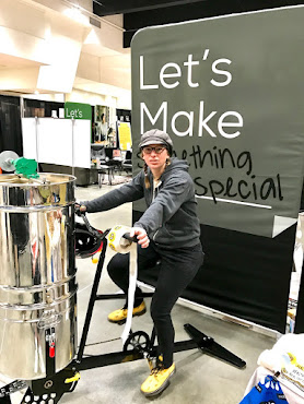 Beez Kneez chief honeyspinner shows her stuff at American Craft Show in St. Paul.