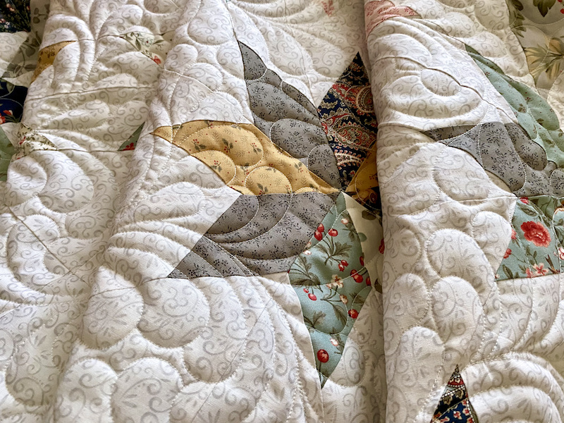 Rebecca Grace Quilting Featherlicious Quilting on a Hunter Star Quilt