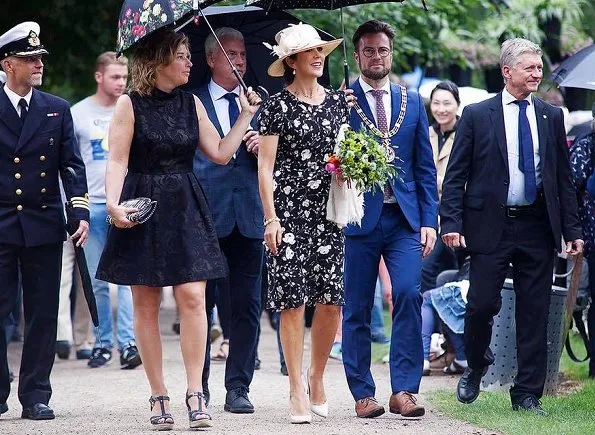 Crown Princess Mary wore a black and white floral dress by Ralph Lauren and Marianne Dulong pearl earring, Gianvito Rossi pumps