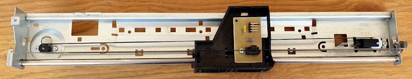 Optical encoder motor control for printer slide unit