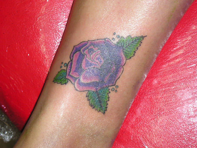 LARY SANTI TATTOO y PIERCING ROCK FUERTE TATUAJES Y PIERCING