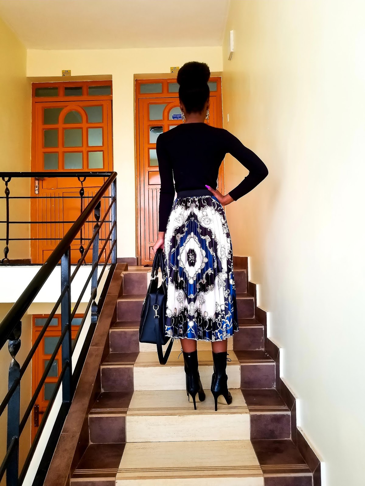 Here's How To Wear A Pleated Skirt In 2019