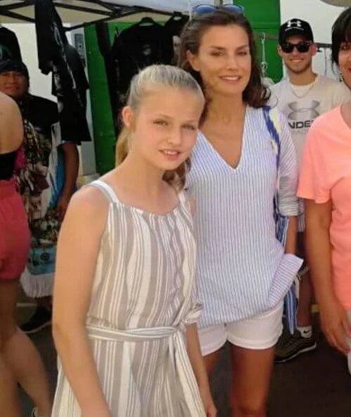 Crown Princess Leonor and Infanta Sofia wore a new linen blend striped jumpsuit by Mango and RIia Menorca Pau sandals