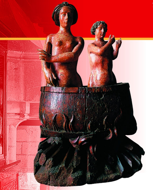 Скульптура представляет юношу и девушку, которые появляются из огромного сосуда, подогреваемого огнем.