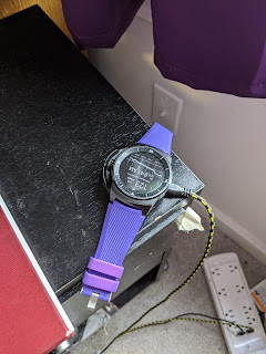 Another view of the watch unable to sit on the charger