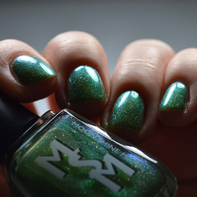 green shimmer nail polish swatch