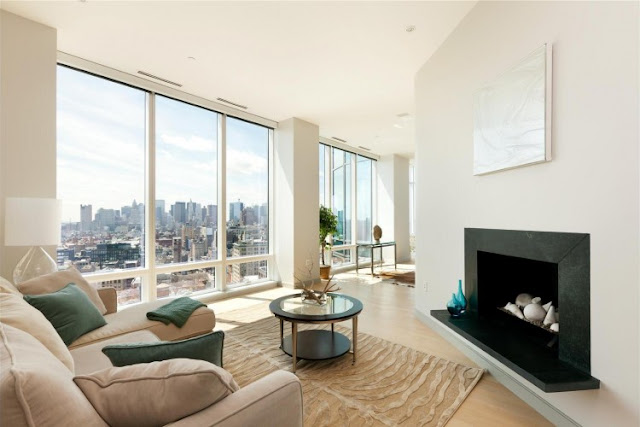 Photo of one of the rooms with fireplace in one of the most beautiful penthouses