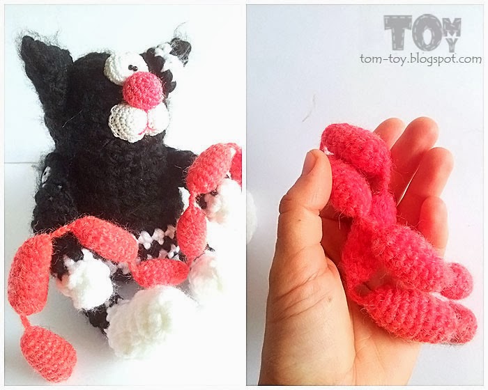 Crochet fat cat with sausages