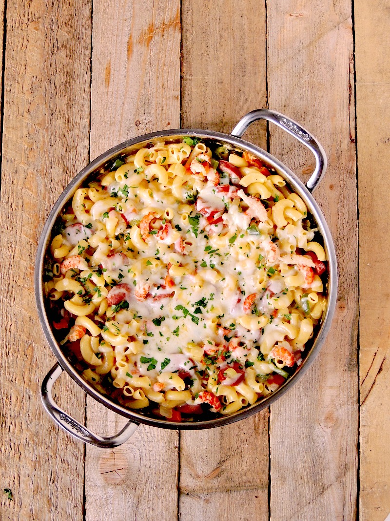 This Jambalaya Pasta with Crawfish and Sausage recipe gives you all of the authentic flavors of your New Orlean's fave, all wrapped in a cheesy pasta dish. #macandcheese #pasta #cheese #cajun #creole #neworleans #mardigras #crawfish #sausage #recipe | bobbiskozykitchen.com