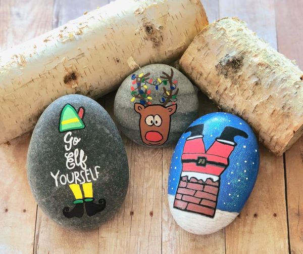 with easy step by step tutorial these three funny Christmas painted rocks are easy to make