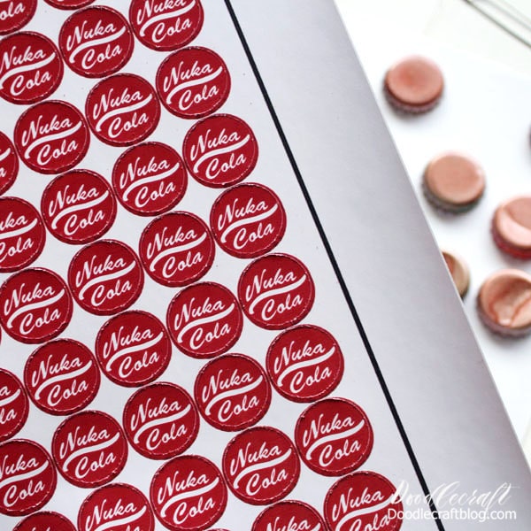 Step 3 for Nuka Cola Caps: Now that the stickers are cut and the caps are painted, simply place a sticker on the top of each cap.