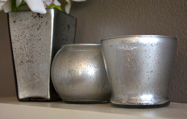 mercury glass candle holders and small vases