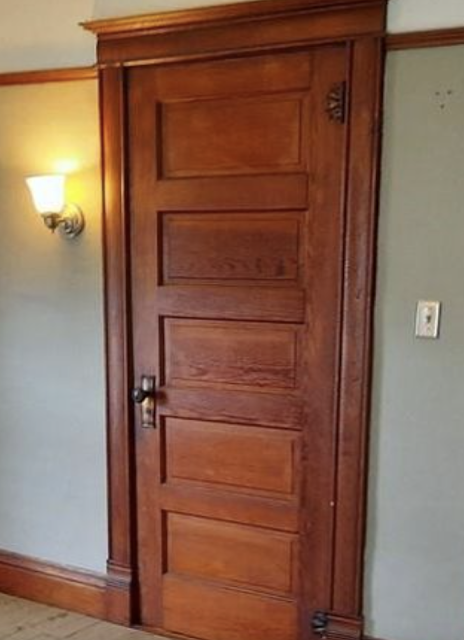 color photo of 5-panel door of Craftsman style in a Sears Avoca