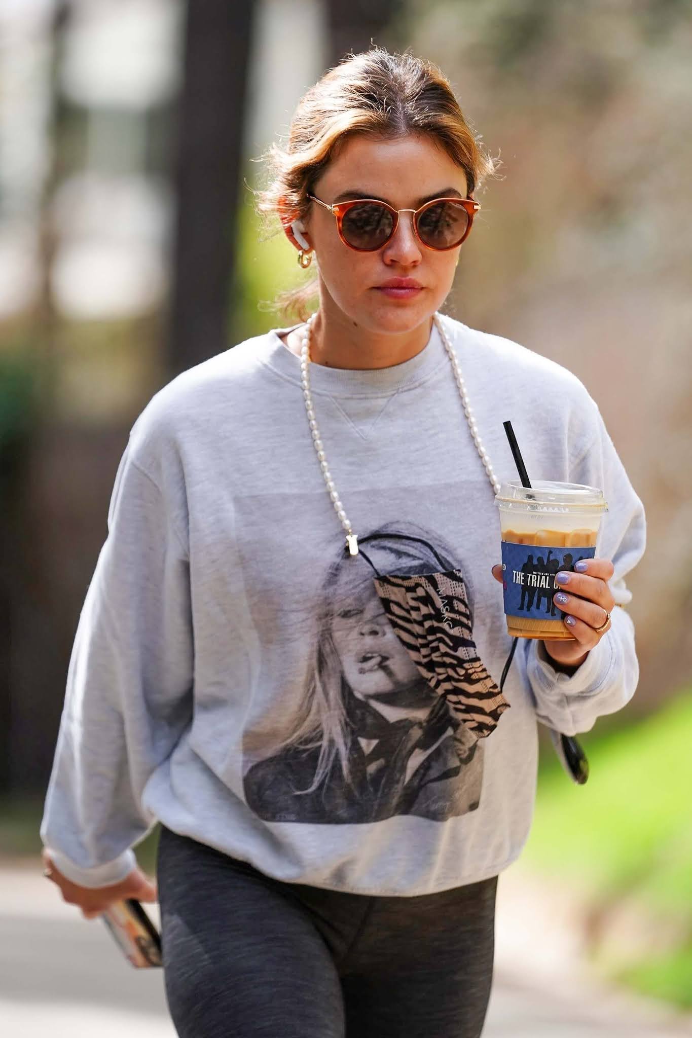 Hottest Celebrity Photos Lucy Hale in black leggings enjoys her coffee