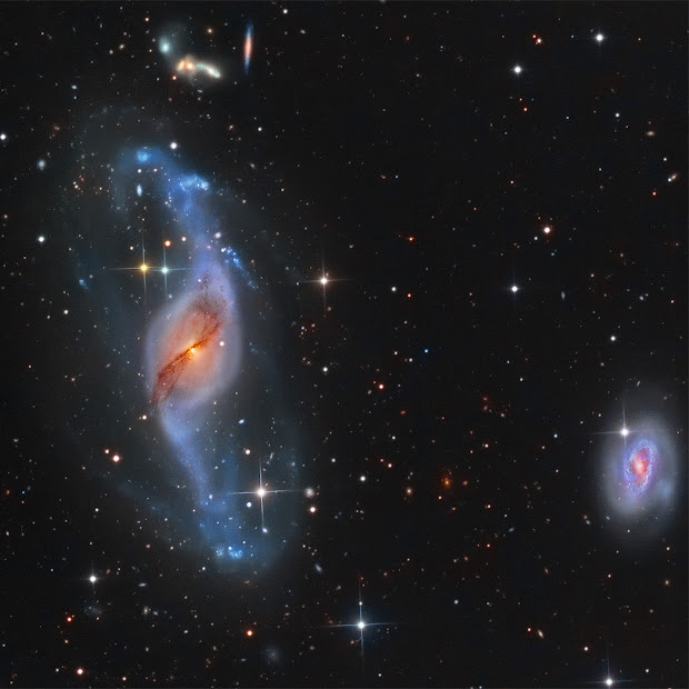 Peculiar Barred Spiral Galaxy NGC 3718