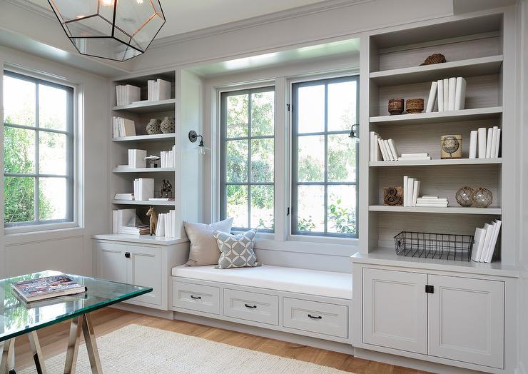 Built in bookshelves around window deals