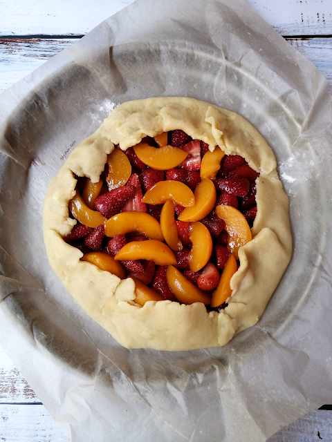 Strawberry and Peach Rustic Galette, food flatlay, flatlay, strawberry galette, peach galette, galette, galette recipe, fruit, strawberries, peaches, dessert, pie, tart, food, food photography, food blogger, food blog, food pictures, food recipe, dessert recipe, pastry, food stylist, spicy fusion kitchen, sweet, fruit tart, fruit galette, fruit pie, rustic galette,